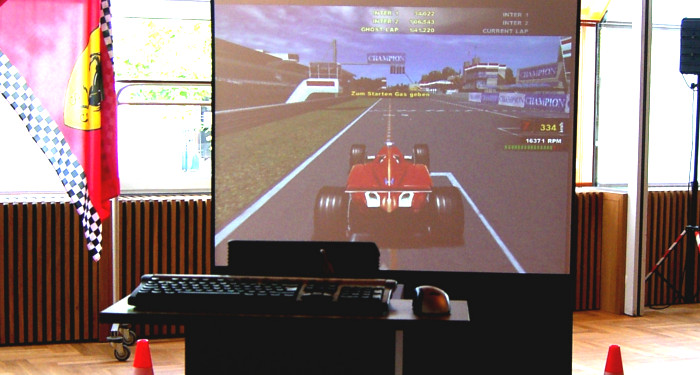 Carrerabahn Teamevent | Racing Simulation auf Beamer
